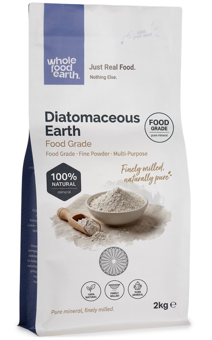 Food grade diatomaceous earth mineral powder from Whole Food Earth, showcasing fine, white, silica-rich particles.