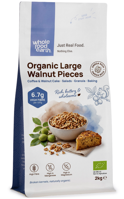 Organic Light Walnuts Pieces from Whole Food Earth, showing close-up of light-colored walnut chunks in a clear bowl.