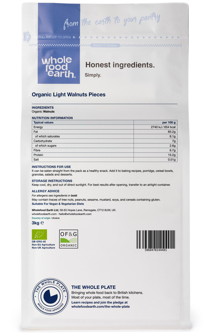 Whole Food Earth organic walnut pieces in a resealable bag, showcasing natural light-colored nut chunks for healthy snacking.