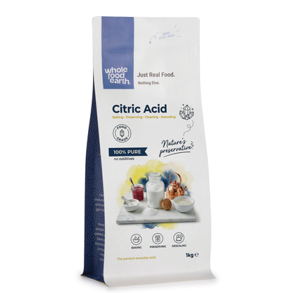 Food-grade citric acid mineral and salt product from Whole Food Earth, showing white crystalline powder in a clear container.