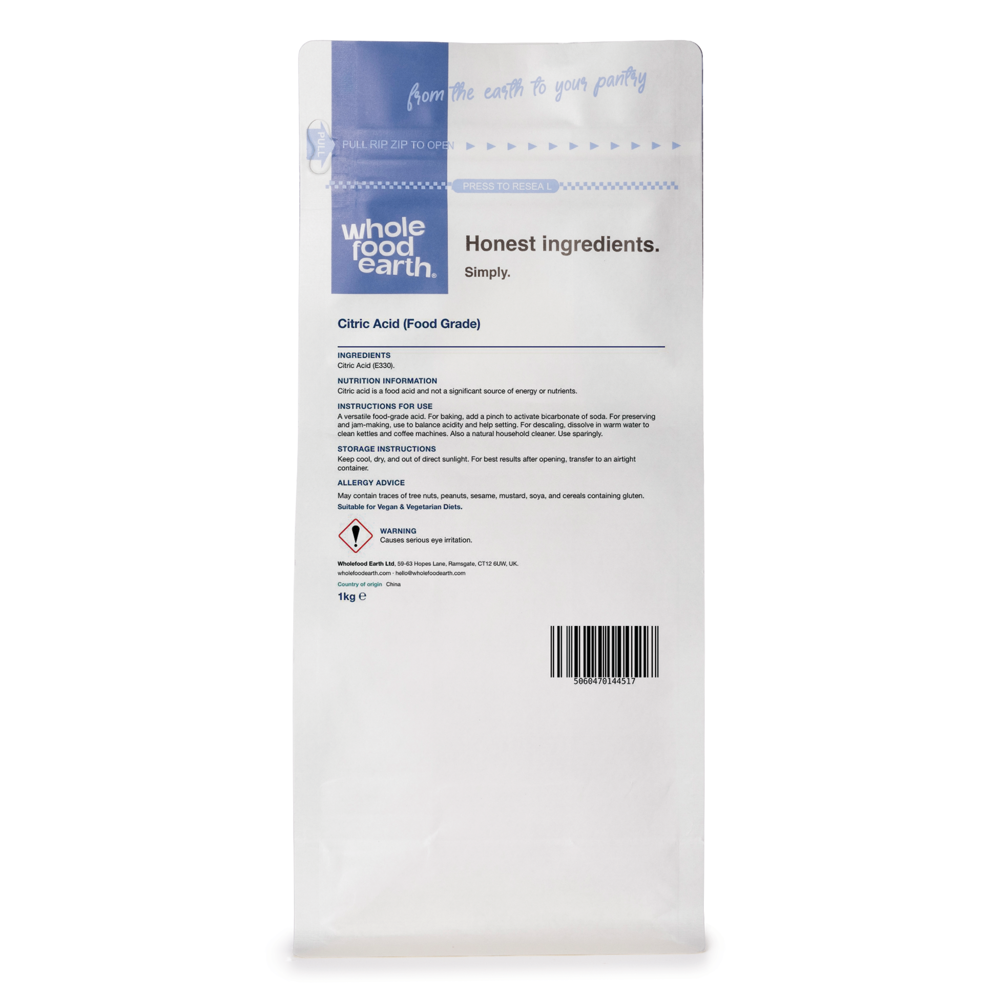 Back view of Whole Food Earth Food Grade Citric Acid in a clear container, showing the white crystalline mineral salt.