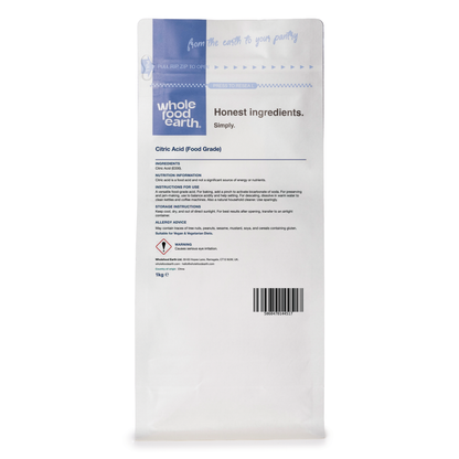 Back view of Whole Food Earth Food Grade Citric Acid in a clear container, showing the white crystalline mineral salt.