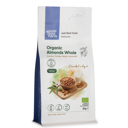 Whole Food Earth organic whole almonds in a clear container, showing their light brown, oval-shaped nut appearance.