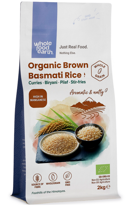 Organic brown Basmati rice from Whole Food Earth, showing a clear package of long, slender rice grains on a white background.