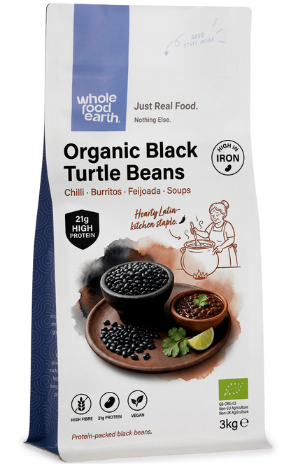 Organic black turtle beans from Whole Food Earth, showing dried, glossy black beans in a close-up view.