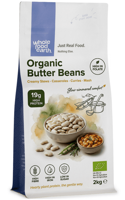 Organic butter beans from Whole Food Earth, showing a close-up of creamy, plump beans in a bowl ready for cooking.