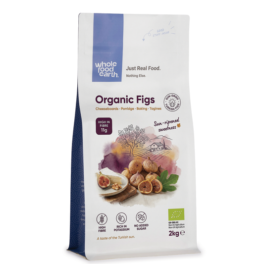 Dried organic figs from Whole Food Earth, showing plump, wrinkled brown figs with natural texture and dried fruit appearance.