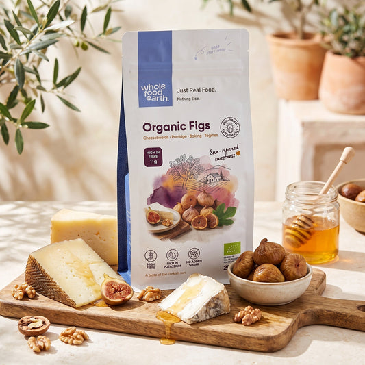 Dried organic figs from Whole Food Earth, showing a close-up of plump, textured figs with natural wrinkled skin.