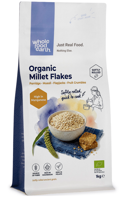 Organic millet flakes cereal from Whole Food Earth in a bowl, showing golden millet flakes on a white background.