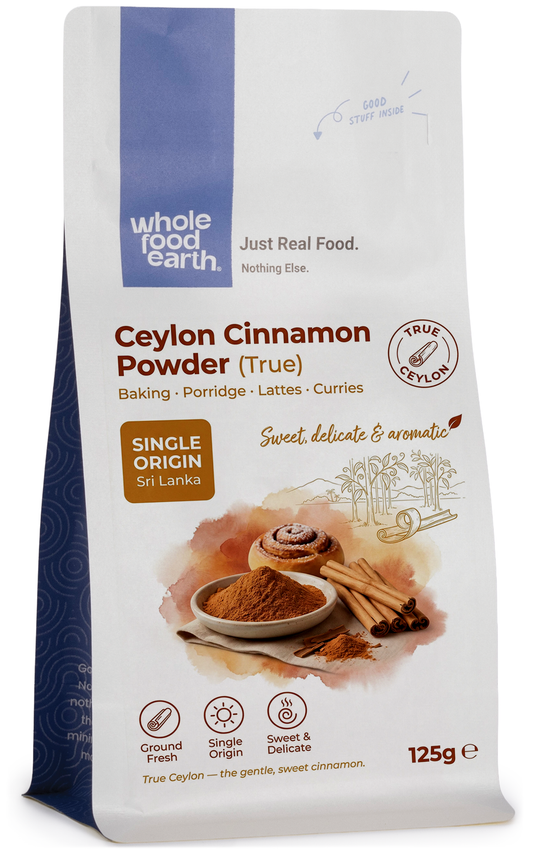 Ceylon cinnamon powder in a jar, Whole Food Earth herb and spice product, showing fine brown Ceylon cinnamon ground spice.
