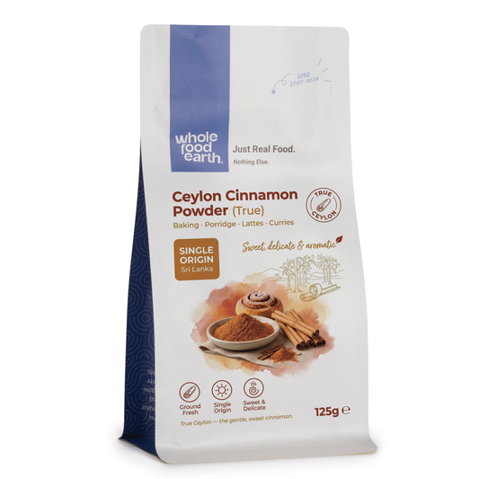 Ceylon cinnamon powder from Whole Food Earth, a fine light brown herb and spice in a clear container, ready for culinary use.