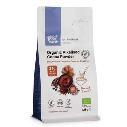 Organic alkalised cocoa powder from Whole Food Earth, shown in a 3D image highlighting its rich, smooth texture.