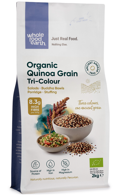 Tri-color organic quinoa grain from Whole Food Earth, showing vibrant, uncooked quinoa seeds in a clear bowl.
