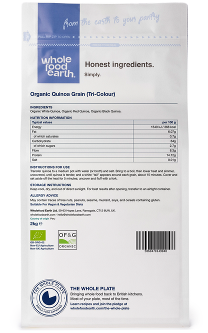 Organic tri-color quinoa grains from Whole Food Earth, showcasing mixed colorful quinoa seeds in a natural setting.