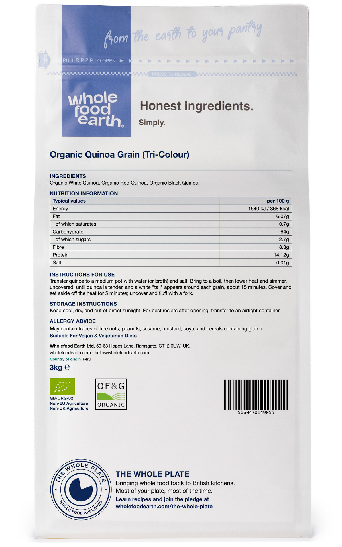 Tri-color organic quinoa grains from Whole Food Earth, displayed in a clear bowl on a wooden surface.