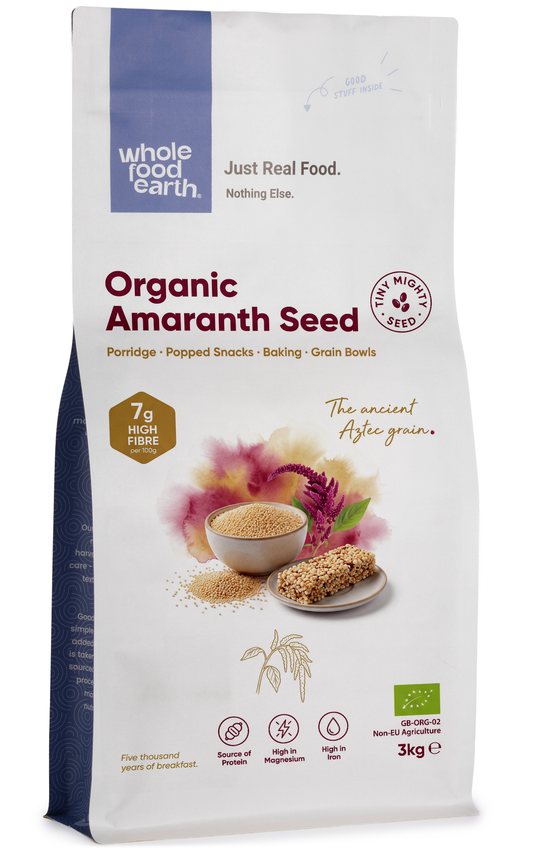 Organic amaranth seeds from Whole Food Earth, small tan grains in a clear container, ideal for gluten-free cooking and healthy grains.