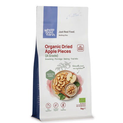 Organic dried apple pieces from Whole Food Earth, A Grade dried fruits with golden-brown, sliced apple chunks on a white background.