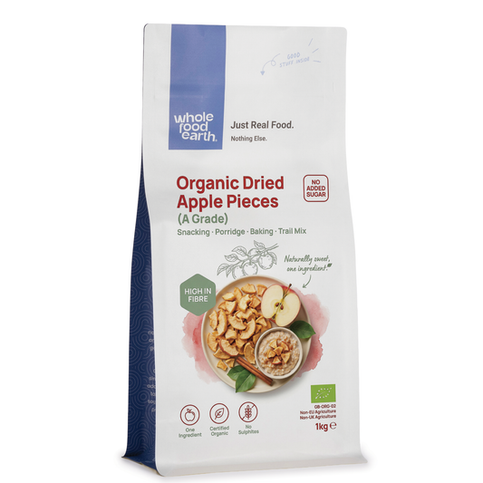 Organic dried apple pieces from Whole Food Earth, A Grade dried fruits with golden-brown, sliced apple chunks on a white background.