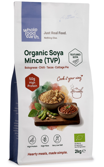 Organic Soya Mince (TVP) from Whole Food Earth, rice and couscous product, showing dried soy protein chunks in a clear bowl.