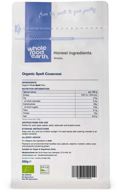 Whole Food Earth organic couscous spelt in a clear container, showing the light beige grains suitable for cooking and baking.