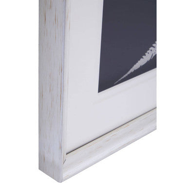 Set of two leaf print wall art pieces by Orsina, featuring botanical designs in complementary frames