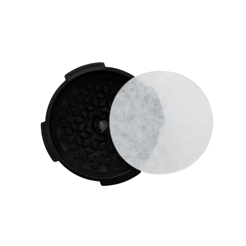 AeroPress Flow Control Filter Cap by Contact Coffee Company Ltd. fitted on an AeroPress for precise coffee brewing control.