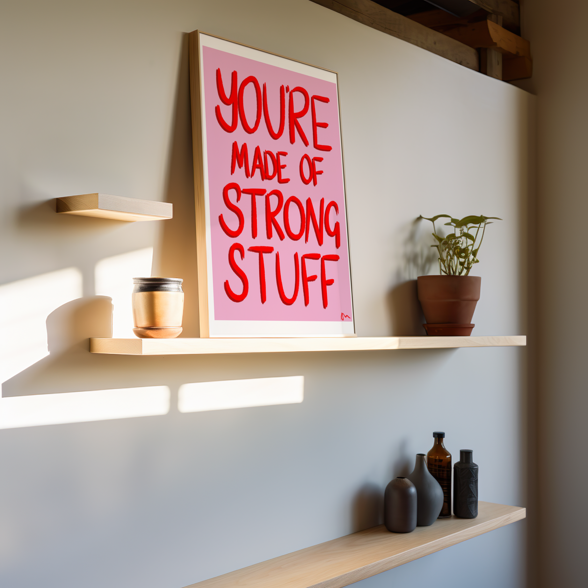 Pink and red inspirational art print with the message "You’re Made of Strong Stuff" by Peak Prints, featuring positive, relatable design.