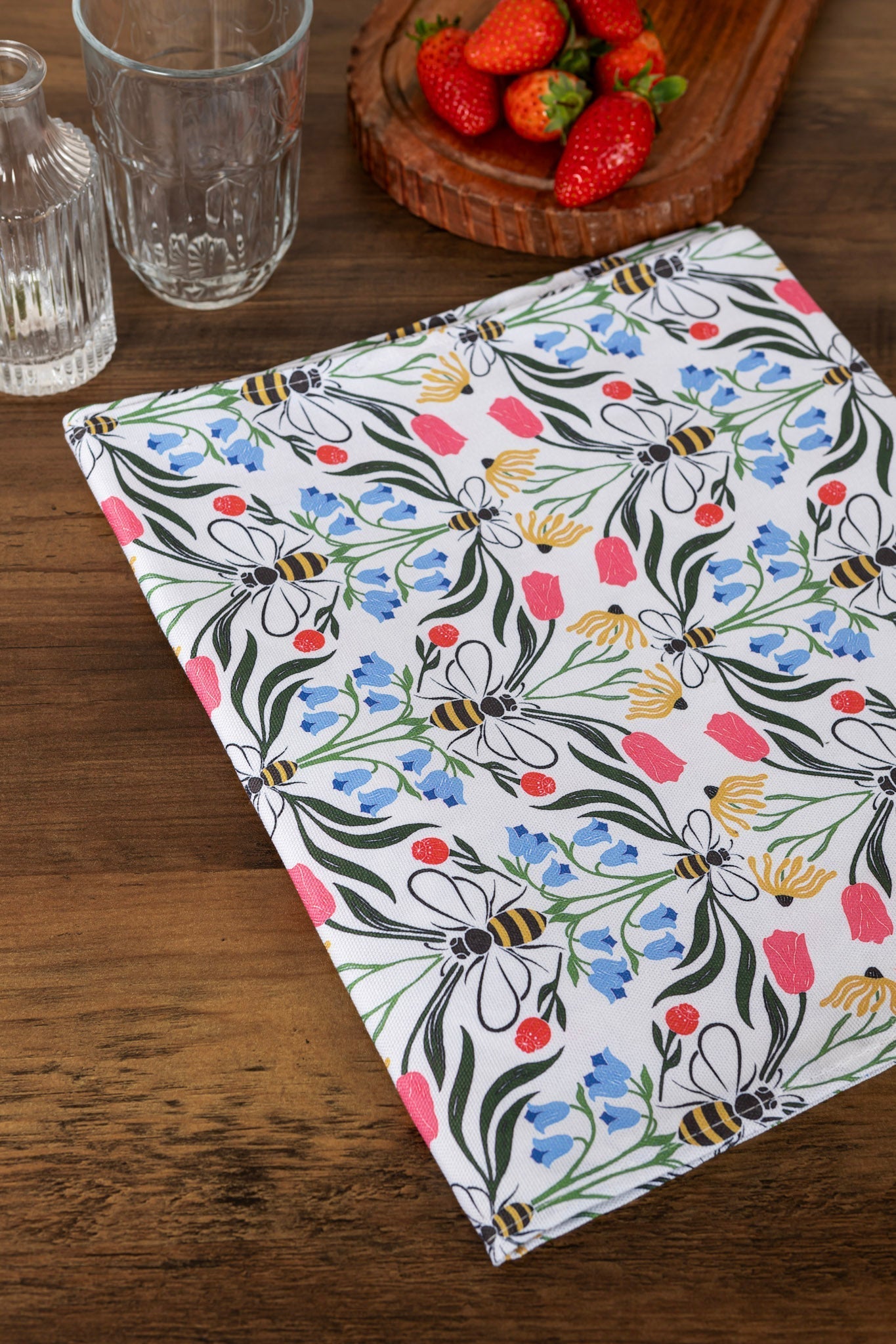Folded Avalon Home UK British Bees table runner featuring a bee and floral pattern on crisp fabric.