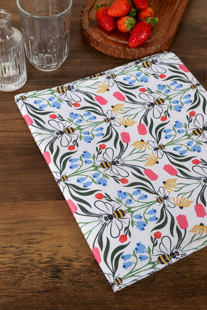 Folded Avalon Home UK British Bees table runner featuring a bee and floral pattern on crisp fabric.