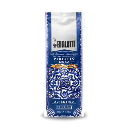 Bialetti Brew Italia Blu Mediterraneo coffee ground in a 250g package, featuring Dolce&Gabbana branding and Mediterranean-inspired design.