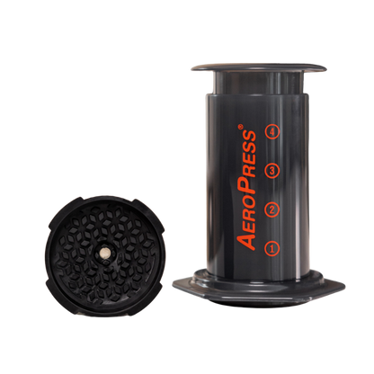 Contact Coffee Company AeroPress Flow Control Filter Cap, a gear accessory for AeroPress coffee makers, shown in black.