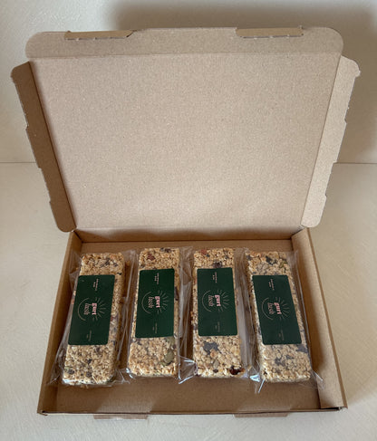 Gurt Lush Food Co granola bars in various flavors, showing close-up of the snack bars with textured oats and ingredients.