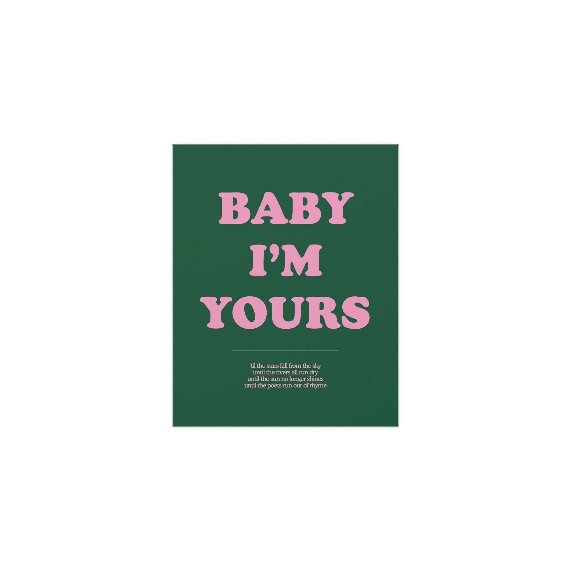 Green and pink "Baby I'm Yours" poster by Glow On Prints, featuring heartfelt typography on a colorful wall background.
