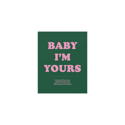 Green and pink "Baby I'm Yours" poster by Glow On Prints, featuring heartfelt typography on a colorful wall background.