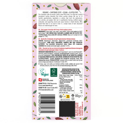 Bennetto Natural Foods UK dark chocolate with fresh raspberries, shown in a close-up image highlighting the berries and chocolate texture.