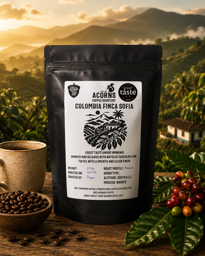 Acorns Coffee & Cake Colombia Finca Sofia coffee bag with scenic landscape design and smooth, balanced flavor profile.