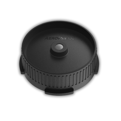 Aeropress Coffee Maker bundle featuring flow control filter cap by Contact Coffee Company Ltd. for precise coffee brewing.