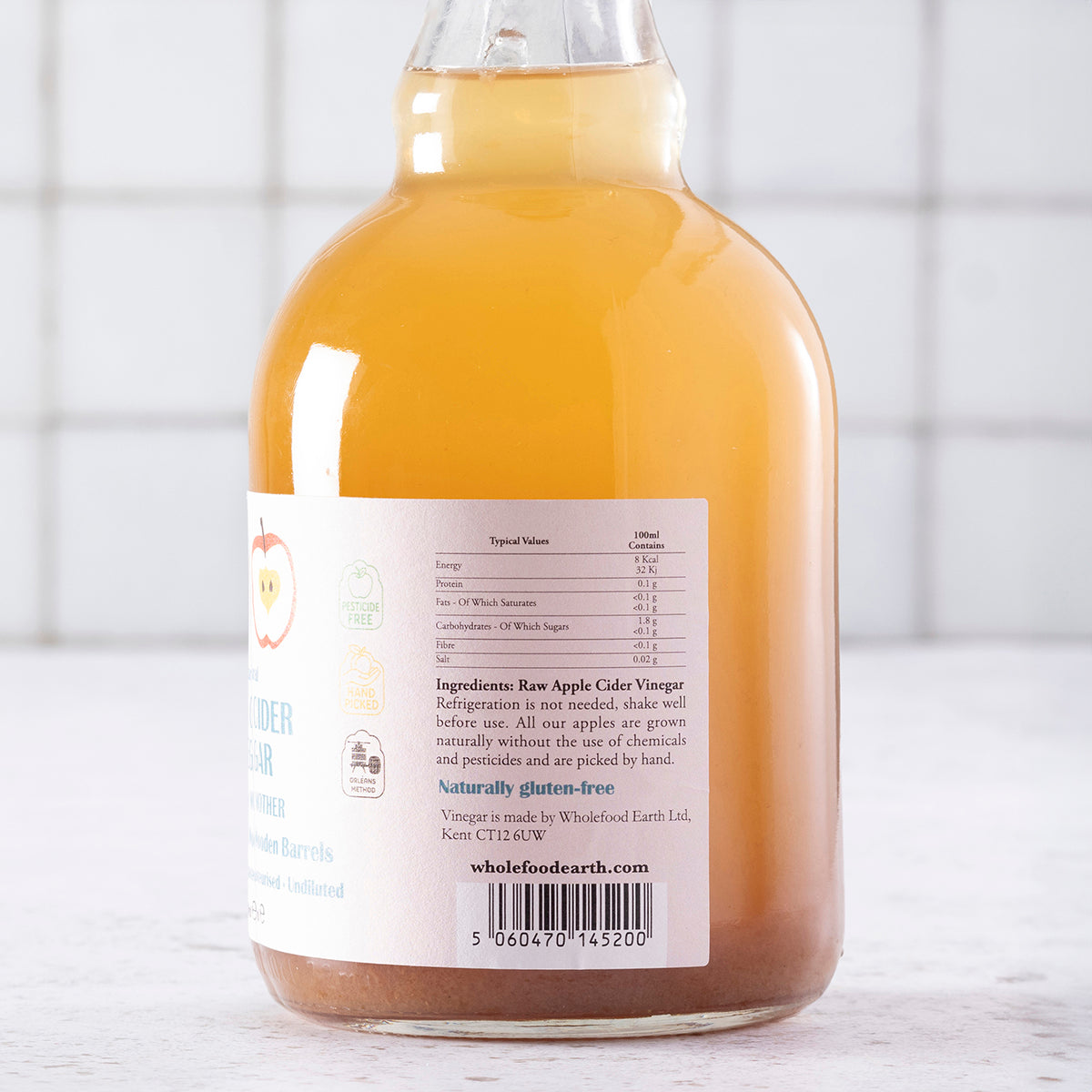 Whole Food Earth Kent apple cider vinegar with Mother, raw, unfiltered, unpasteurized, GMO-free vinegar drink in a 1L bottle.