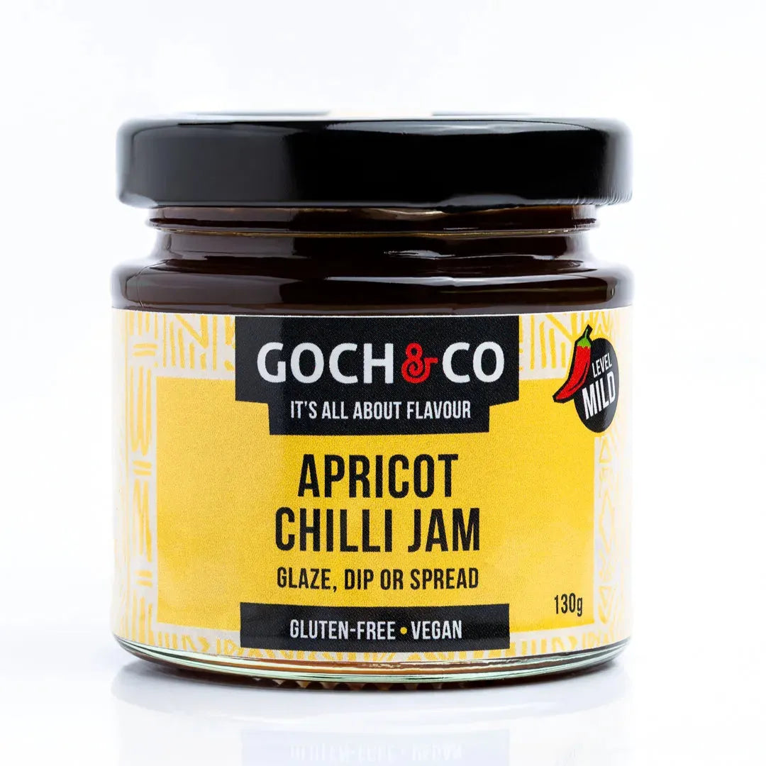 Jar of Goch & Co Apricot Chilli Jam showing the label and a glimpse of the apricot and chilli ingredients on the packaging.