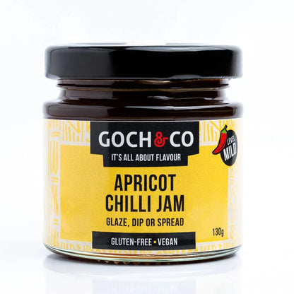 Jar of Goch & Co Apricot Chilli Jam showing the label and a glimpse of the apricot and chilli ingredients on the packaging.