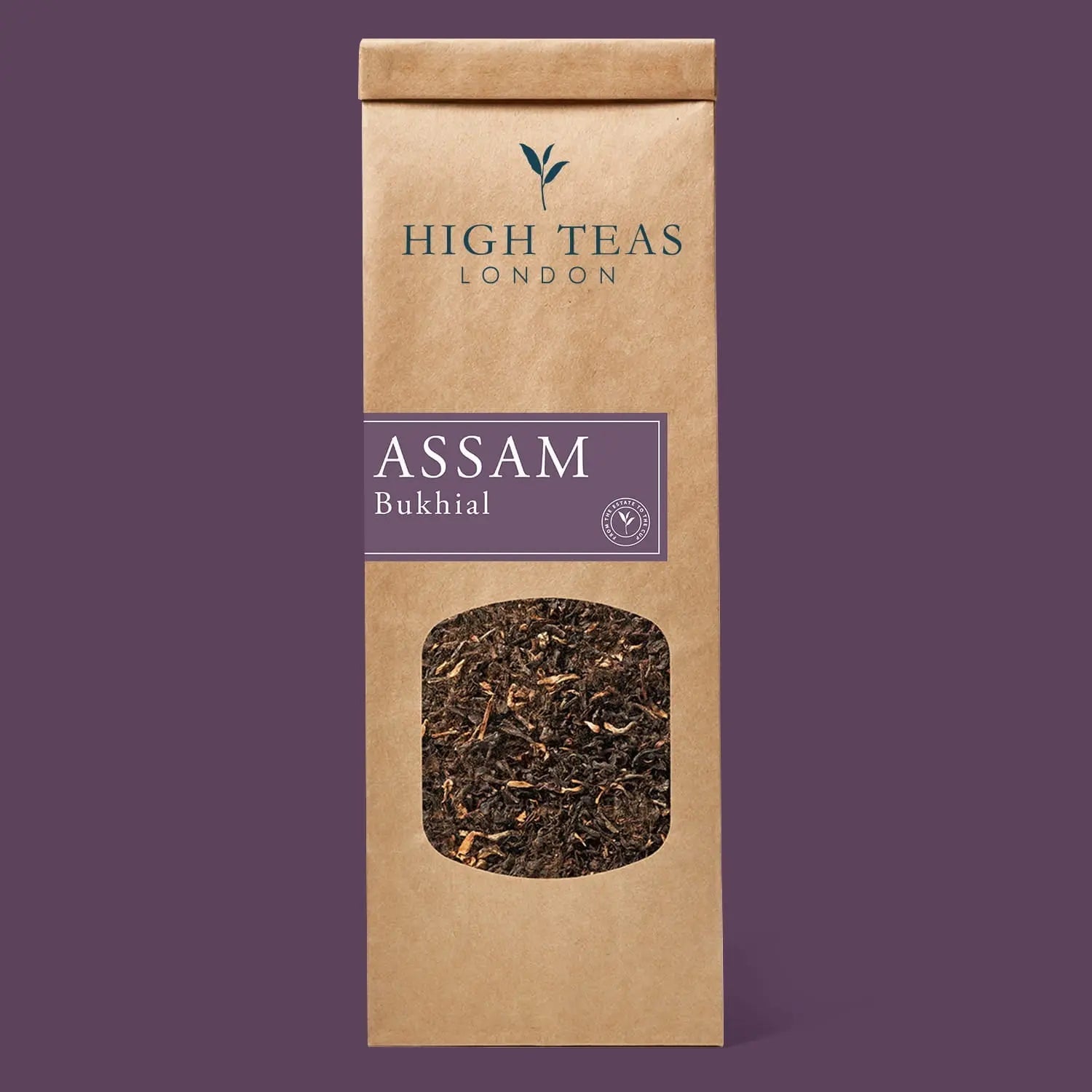 Assam Mangalam FTGFOP1 tea leaves from High Teas, close-up of finely rolled, high-quality Assam Mangalam tea in a clear container.