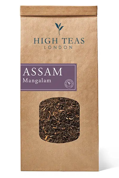 Assam Mangalam FTGFOP1 tea leaves from High Teas, showcasing shiny, whole leaf Assam tea with golden tips.