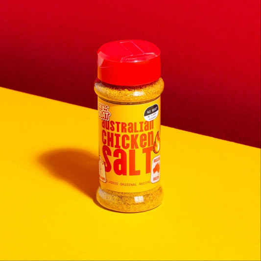 Australian Chicken Salt by The GOAT Seasoning Blends in a 100g shaker bottle, with golden seasoning visible inside.
