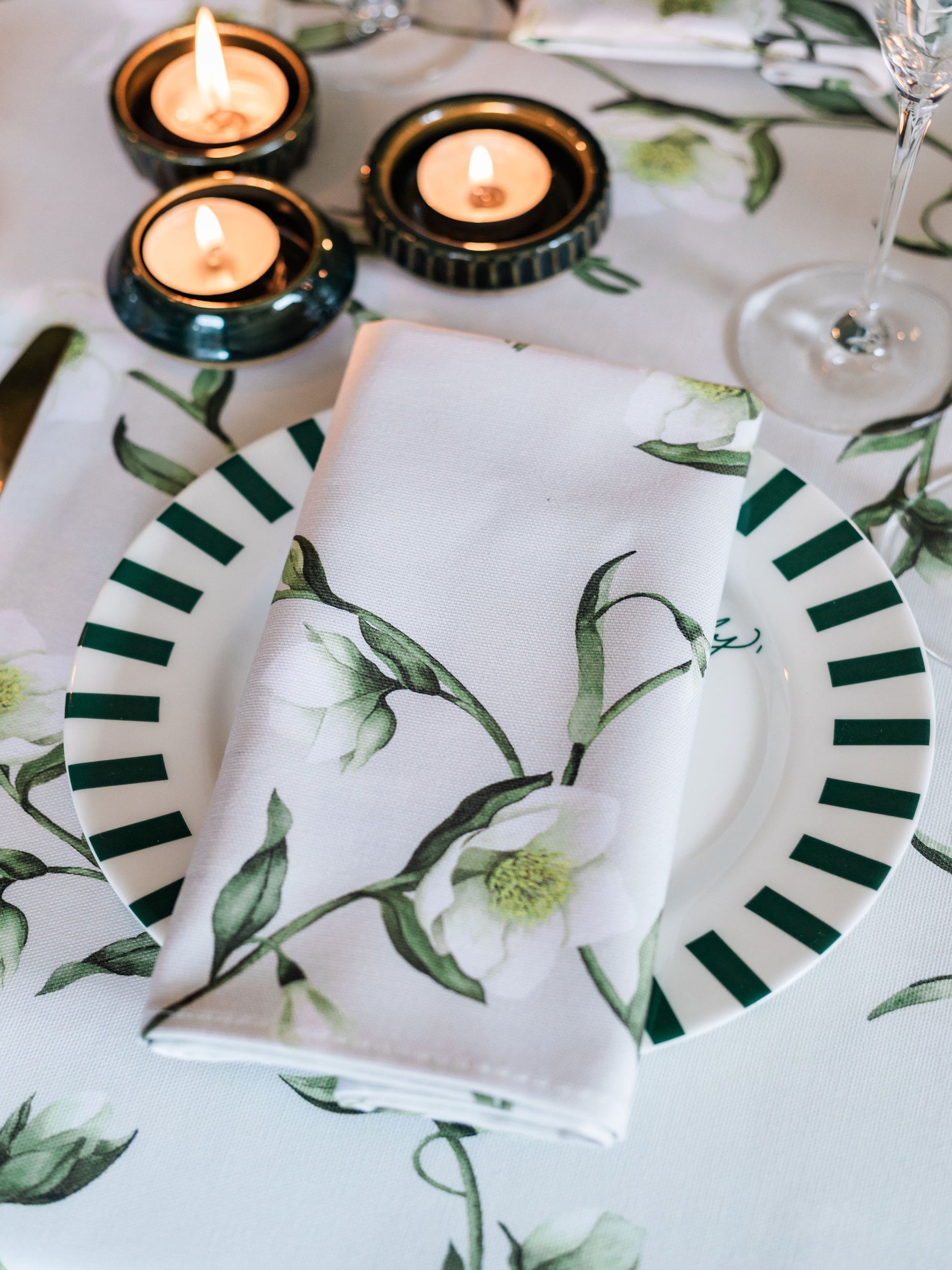 Pair of Avalon Home UK snowdrop and hellebore floral napkins featuring spring and summer botanical prints.