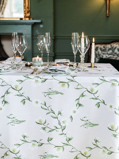 Snowdrop and hellebore floral tablecloth by Avalon Home UK, featuring a spring-inspired botanical pattern on a light fabric.