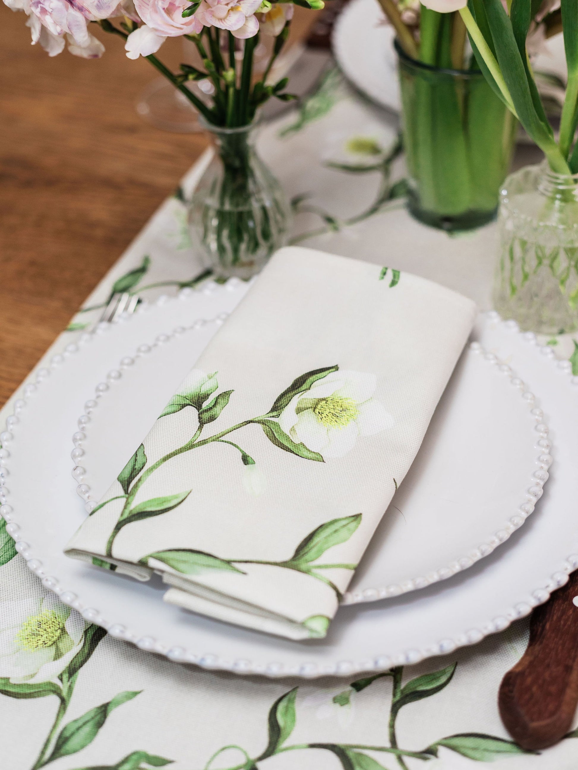 Pair of Avalon Home UK Snowdrop and Hellebore floral napkins for spring and summer table decor.