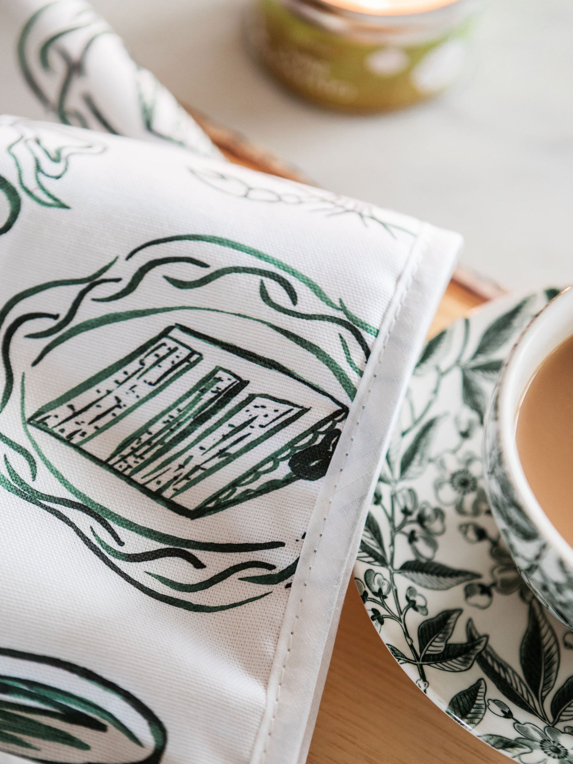 Avalon Home UK Just A Girl oven glove with pink and white floral design, heat-resistant kitchen accessory for cooking and baking.