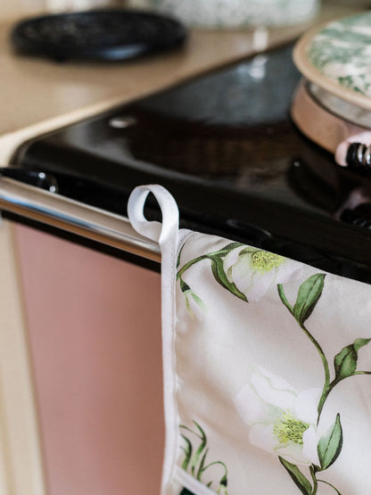 Avalon Home UK snowdrop and hellebore oven glove with floral design, ideal for kitchen safety and decoration.