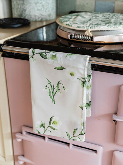 Snowdrop and hellebore floral tea towel by Avalon Home UK, featuring spring floral designs on soft fabric.