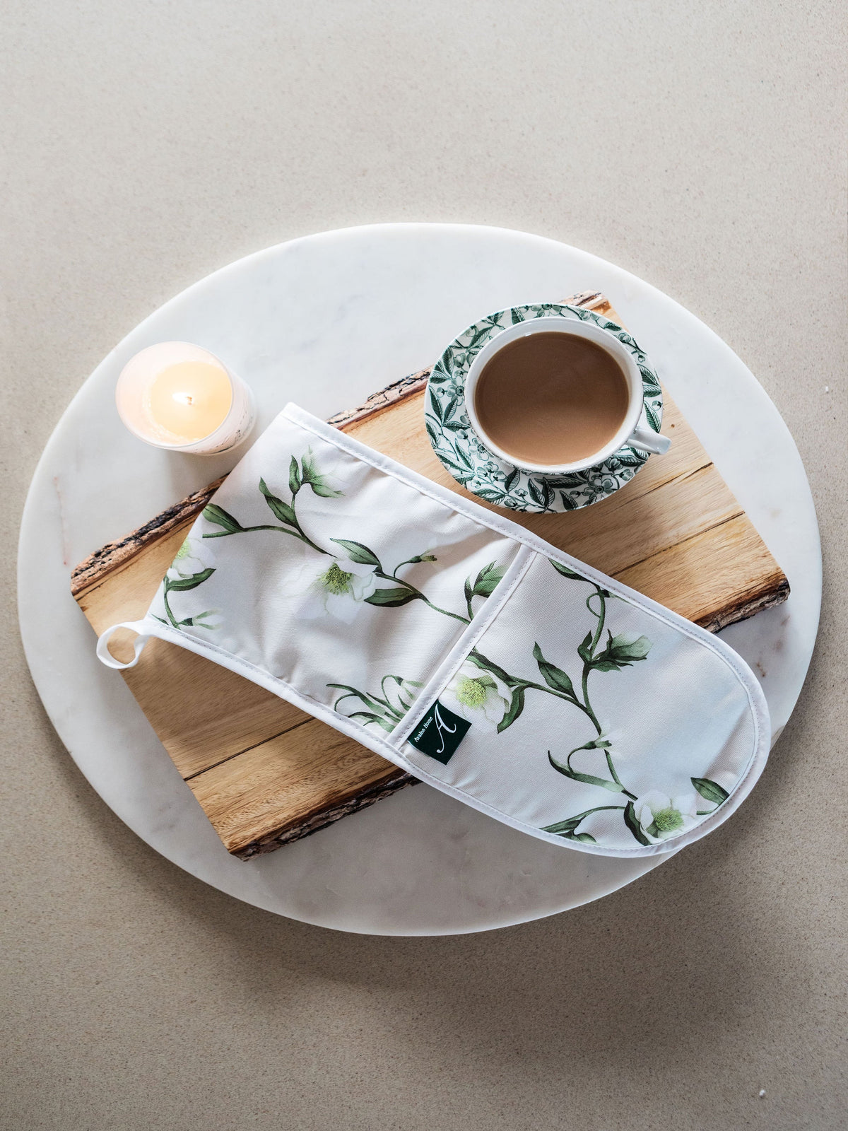 Avalon Home UK snowdrop and hellebore oven glove with floral pattern, designed for kitchen protection and decorative use.
